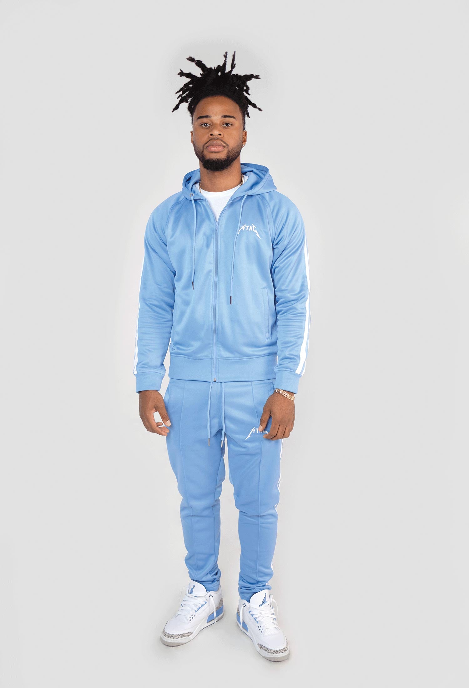 MODEL WEARING SIZE M SKY BLUE TRACKSUIT 